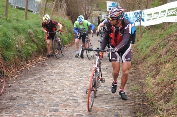 Tourists struggle up the Koppenberg.