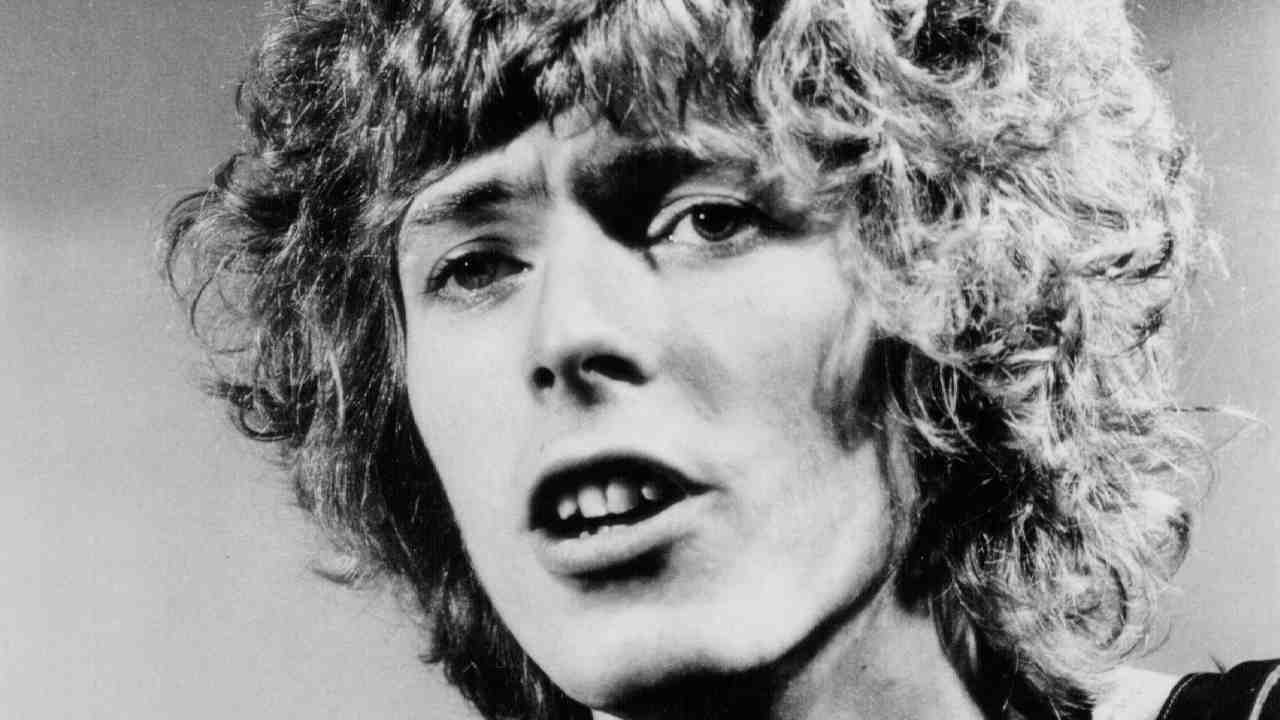 David Bowie posing for a photograph in 1969