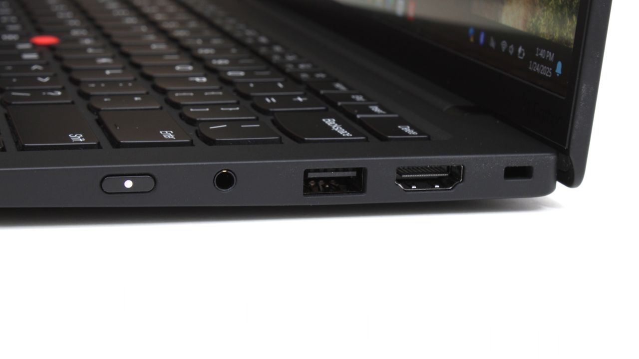 A close up of connectivity ports on the side of a laptop.