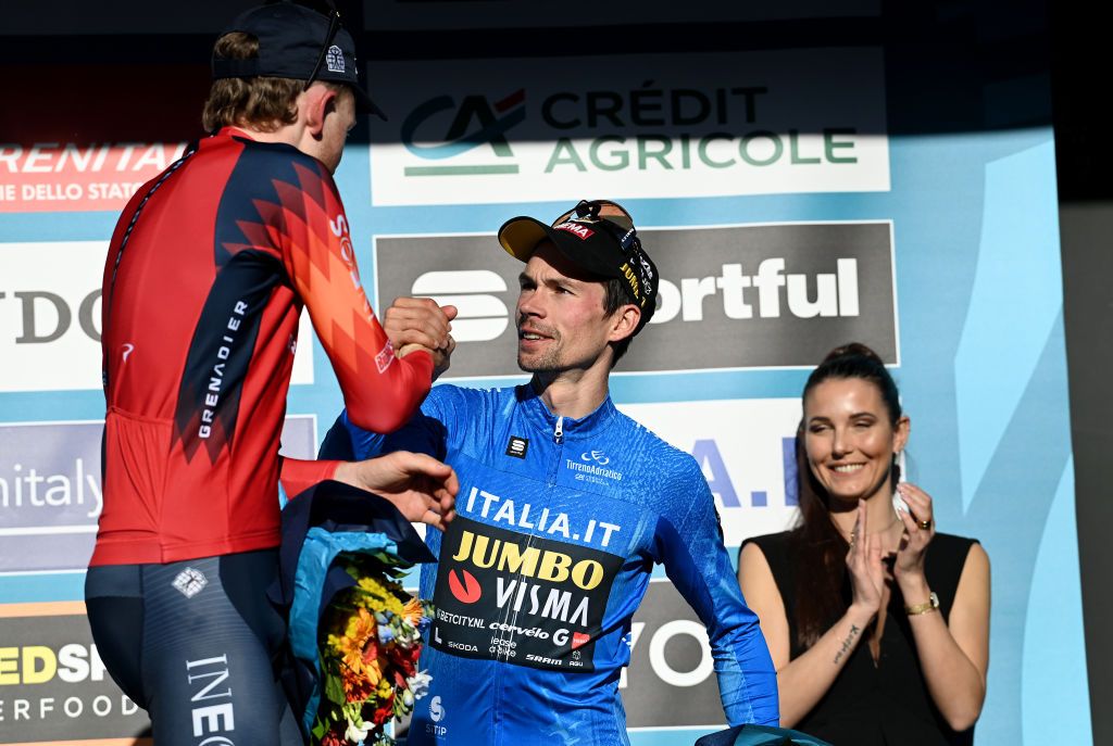 SAN BENEDETTO DEL TRONTO ITALY MARCH 12 The race winner Primoz Roglic of Slovenia and Team Jumbo Visma Blue Leader Jersey R and third classified Tao Geoghegan Hart of The United Kingdom and Team INEOS Grenadiers Lcongratulate each other at podium during the 58th TirrenoAdriatico 2023 Stage 7 a 154km stage from San Benedetto del Tronto to San Benedetto del Tronto UCIWT TirrenoAdriatico on March 12 2023 in San Benedetto del Tronto Italy Photo by Tim de WaeleGetty Images