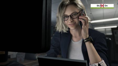 Screenshot of Resident Evil Requiem cutscene with Grace Ashcroft at desk while on phone and DLSS 5 on badge in top right corner with red cross over.