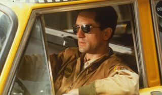 Taxi Driver Robert DeNiro behind the wheel of his cab