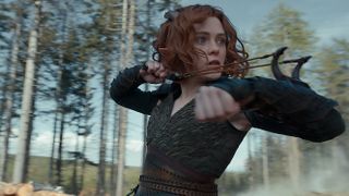 Doric (Sophia Lillis) drawing a wrist-mounted slingshot in Dungeons & Dragons: Honor Among Thieves