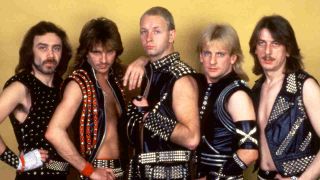 Judas Priest posing for a photograph in leather and studs in 1984