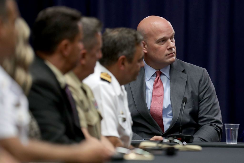 Acting Attorney General Matt Whitaker, right