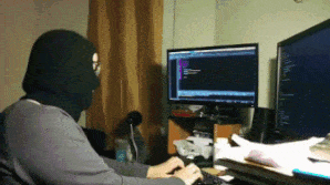 hacker with mask typing