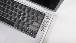 Titanium G4 PowerBook on a white background
