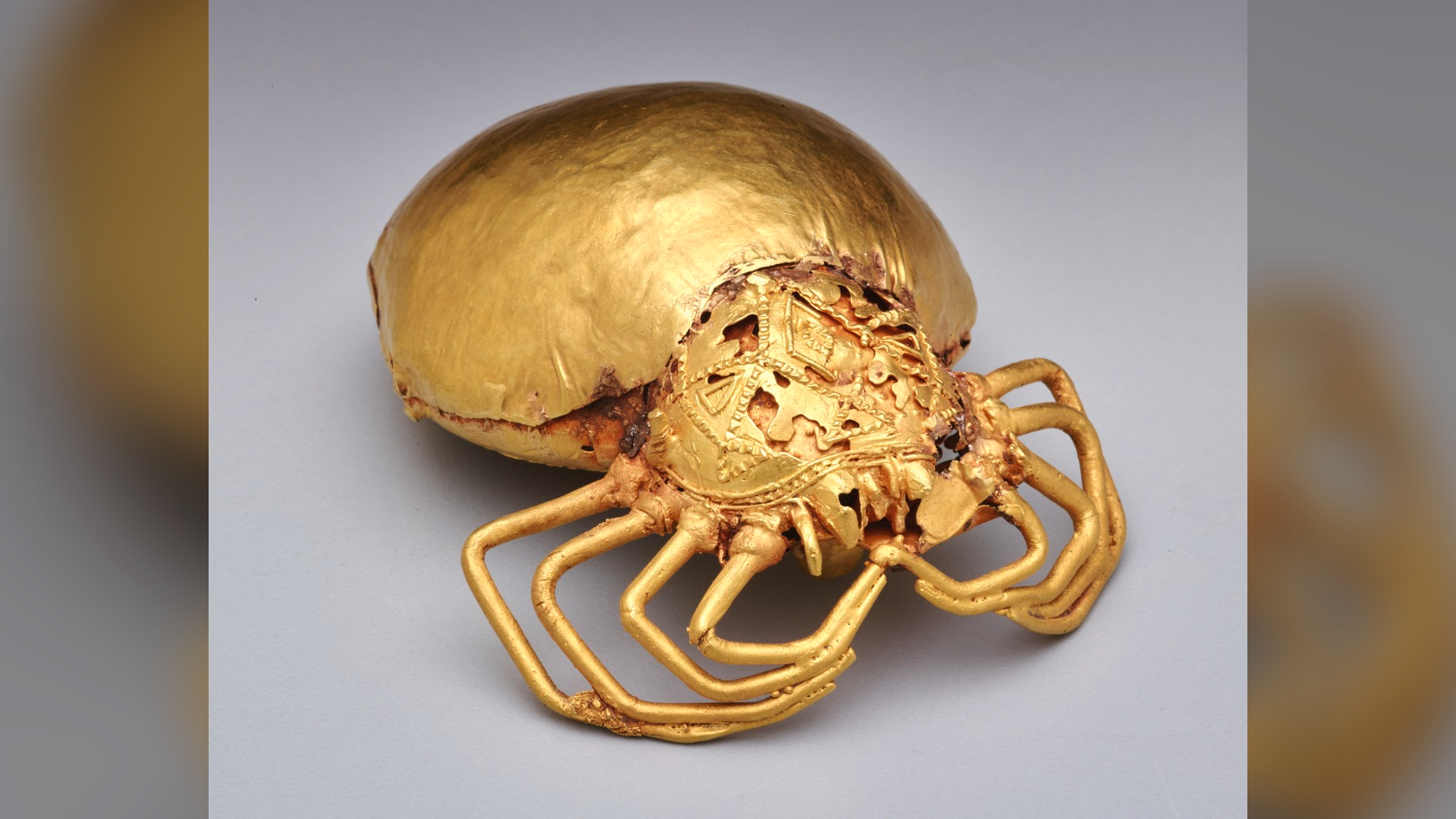 The spider-shaped sword ornament was created in Ghana in the 19th century and was passed down in a Texas family for generations.