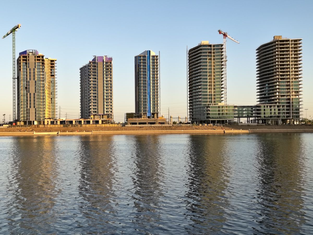 A photo of a lake and buildings captured with the Motorola Razr 2025 at 2x zoom.