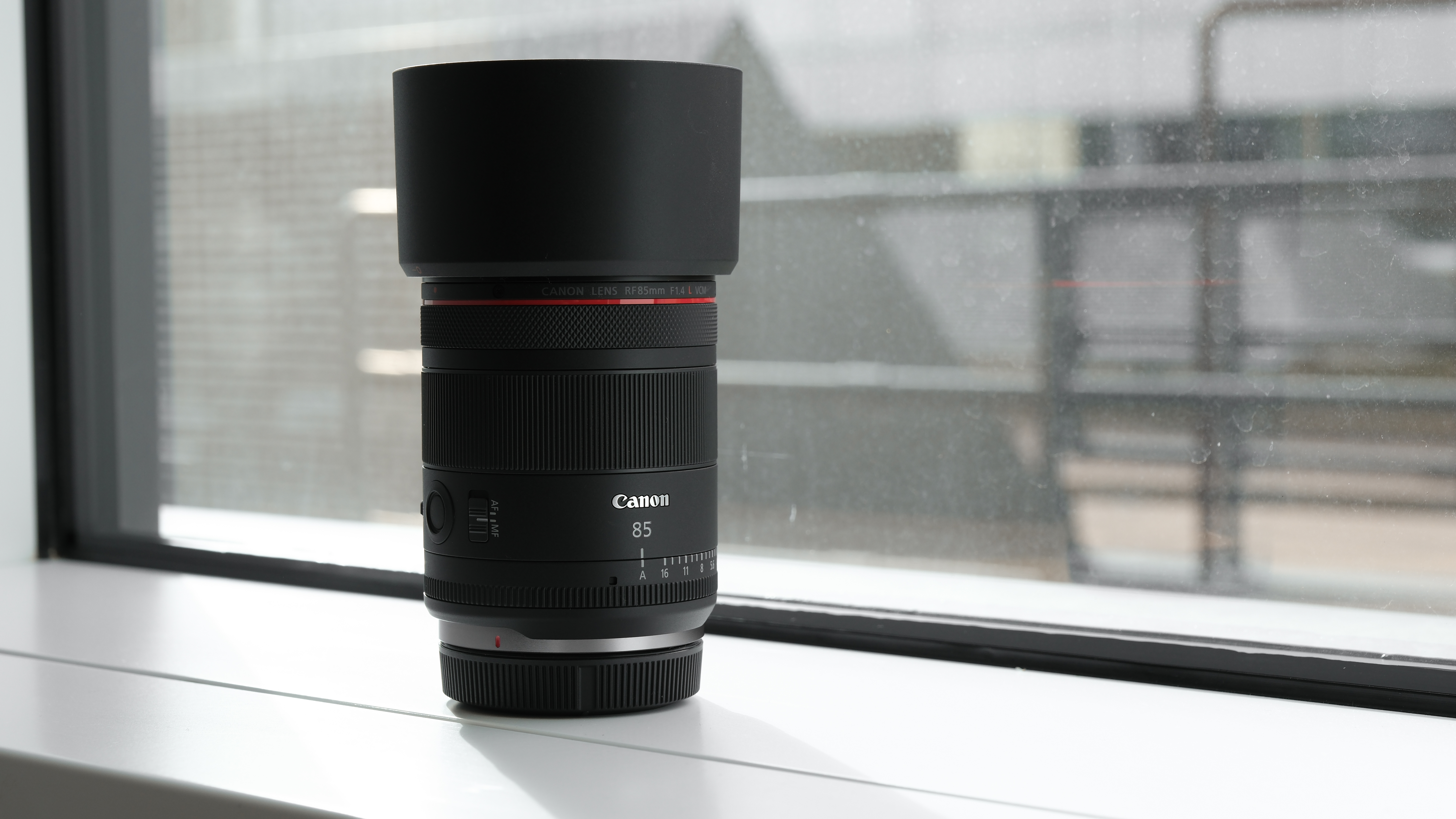 Canon RF 85mm f/1.4L VCM against a window