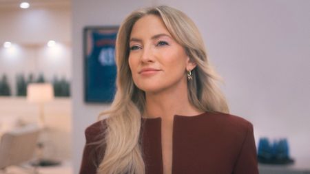 Kate Hudson looks at something offscreen