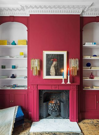 a room painted in a vibrant magenta red