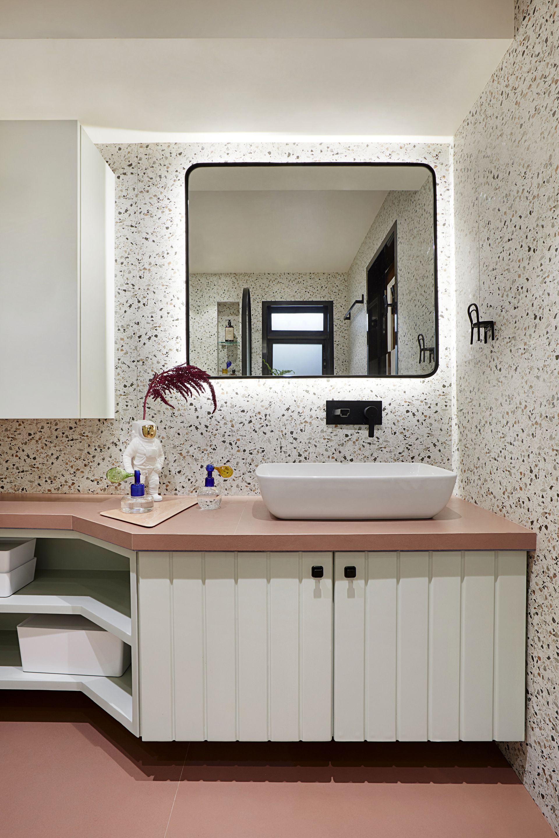 A bathroom with acrylic bins