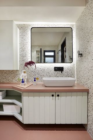 A bathroom with acrylic bins