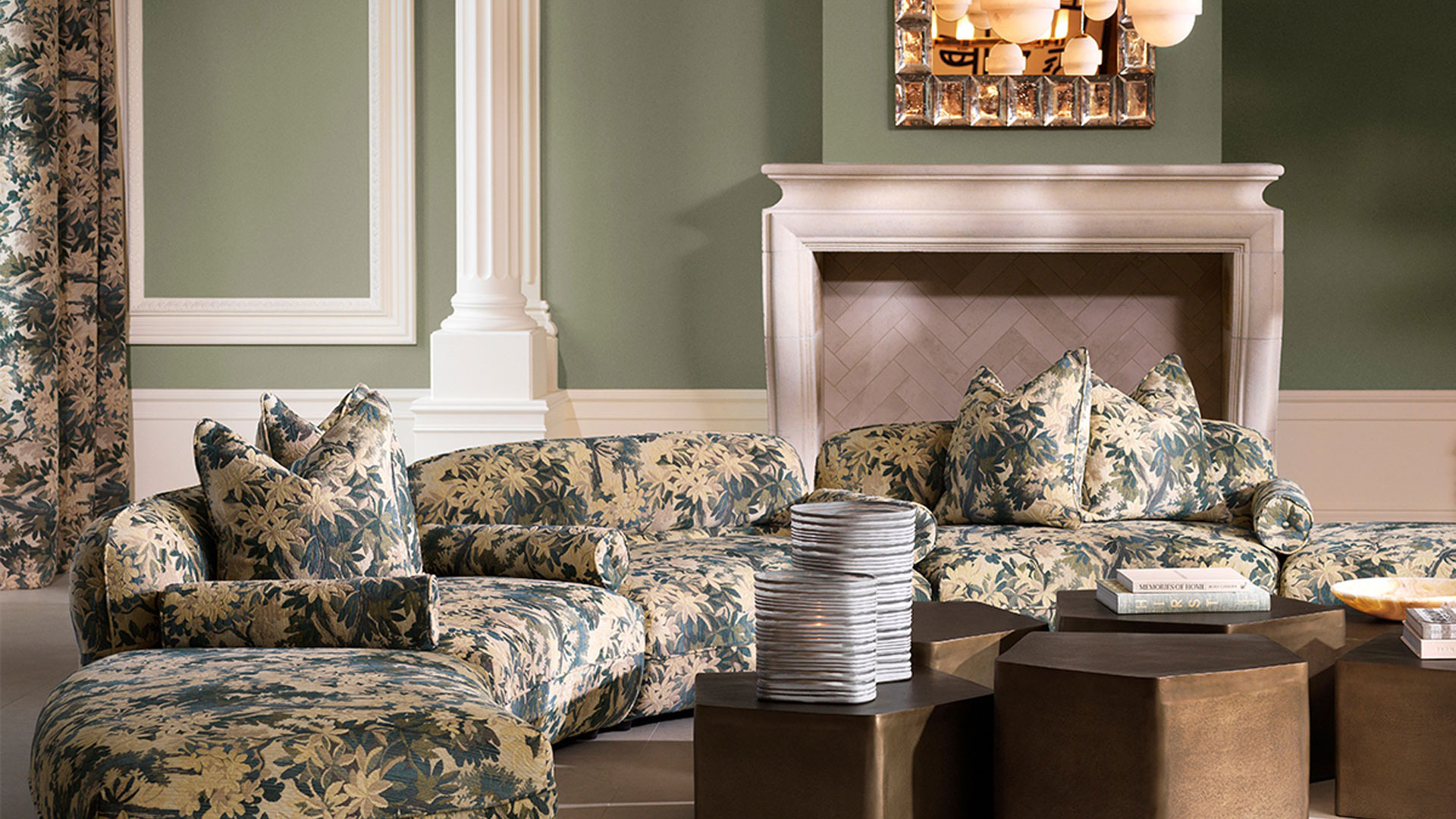 grand green living room with relief panels on walls and floral sofa