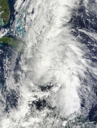 The MODIS instrument on NASA's Terra Satellite captured this visible image of Hurricane Tomas over Haiti, Cuba, Jamaica, and the Dominican Republic at 15:30 UTC (11:30 a.m. EDT) on Nov. 5.