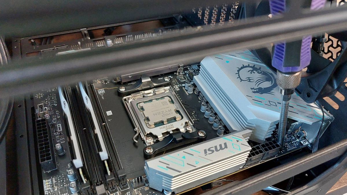 The Corsair Frame 4000X PC case seen at various stages of a PC build. This is a modular, mid-tower case with lots of options for customisation.