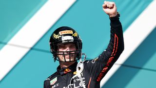Race winner Max Verstappen of the Netherlands and Oracle Red Bull Racing celebrates on the podium during the F1 Grand Prix of Miami at the Miami International Autodrome 