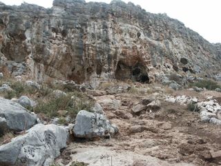 Misliya Cave, where part of an adult upper jaw was found, is located along the western slopes of Mount Carmel, Israel.