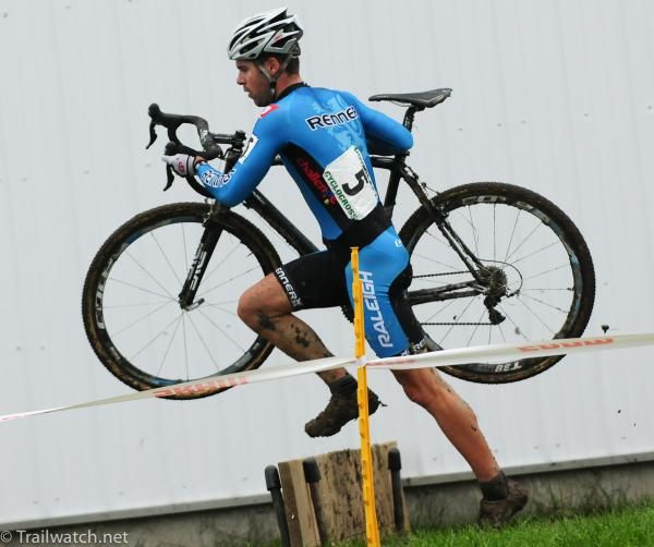Craig Richey (Renner Custom XC Team) racing over the barriers in third position