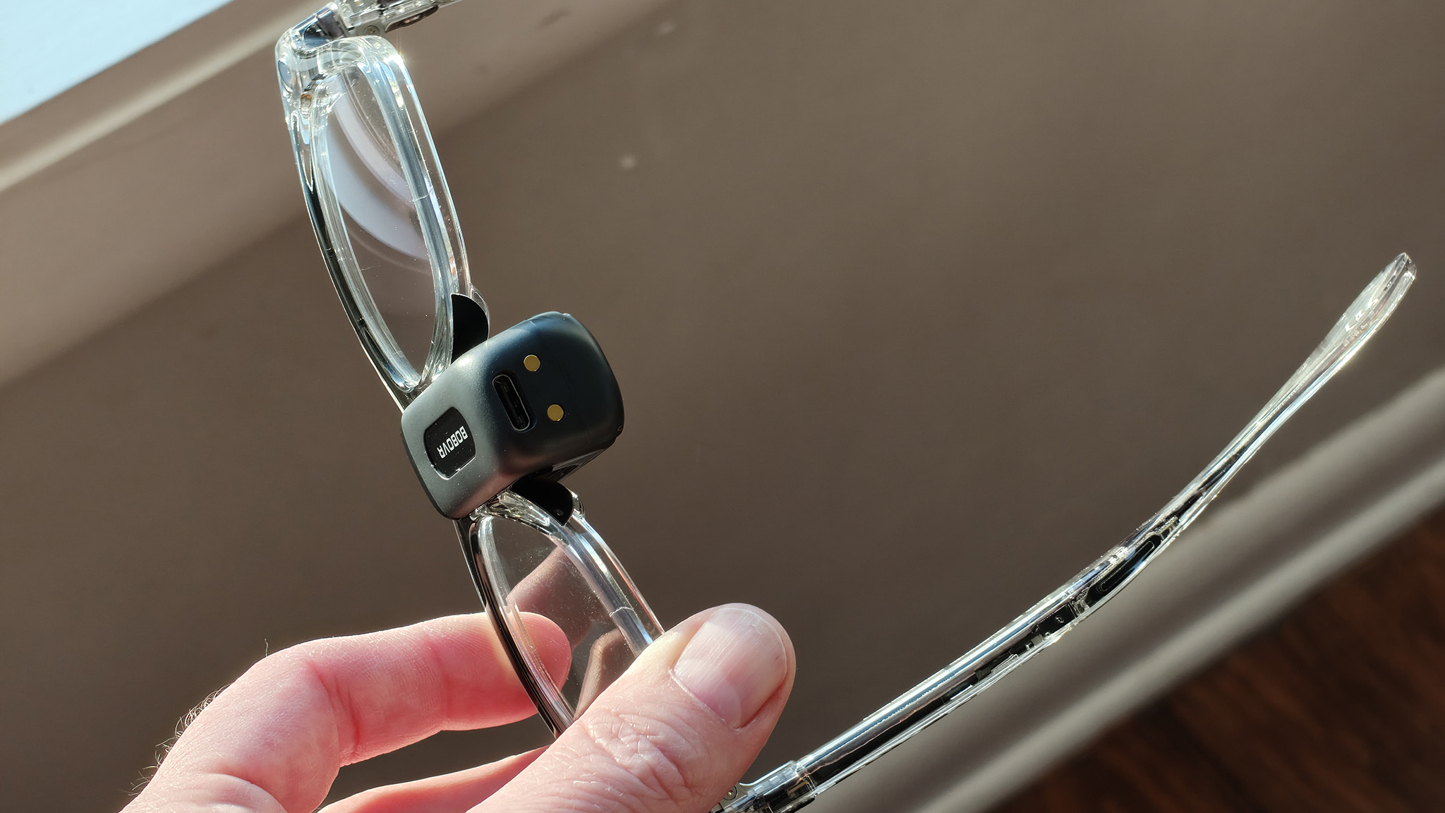 Holding a BoboVR CG2 battery