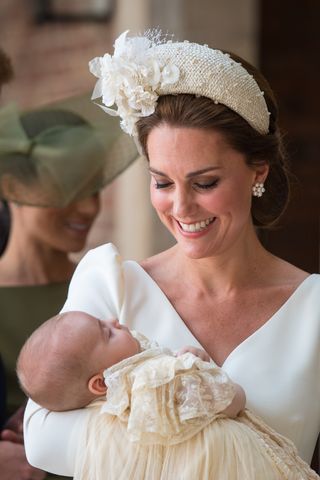 Kate Middleton holding Prince Louis at his christening in 2018