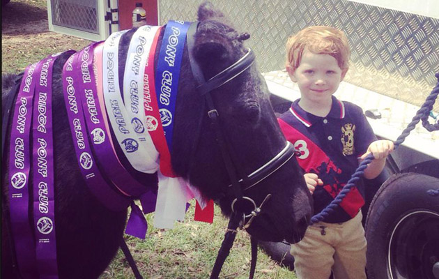 Jacob and Tommy with their ribbons from the led line classes at the local hack show