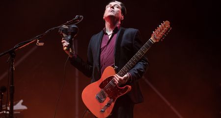 Troy Van Leeuwen of Queens of the Stone Age with his 12-string Squier Tele