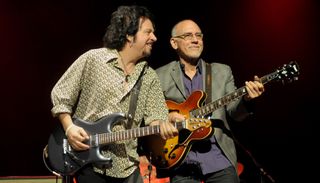 Steve Lukather (left) and Larry Carlton perform onstage at the AC Hall in Hong Kong on February 5, 2015