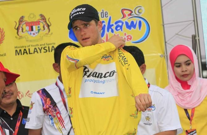 Bos pulls on the yellow jersey