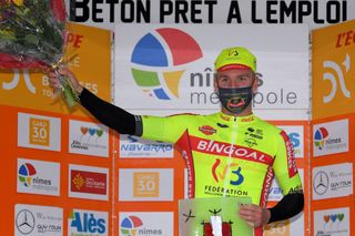 LA CALMETTE FRANCE FEBRUARY 04 Podium Timothy Dupont Belgium and Team Bingoal WB winner of 2nd stage celebrate during the 51st toile de Bessges Tour du Gard 2021 Stage 2 a 154km stage from SaintGenis to La Calmette Trophy Flowers Mask Covid safety measures Hostess EDB2020 on February 04 2021 in La Calmette France Photo by Luc ClaessenGetty Images