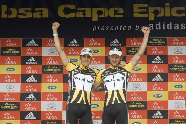 Team Bulls' Stefan Sahm and Karl Platt on the podium as overall leaders after stage four at the Cape Epic.