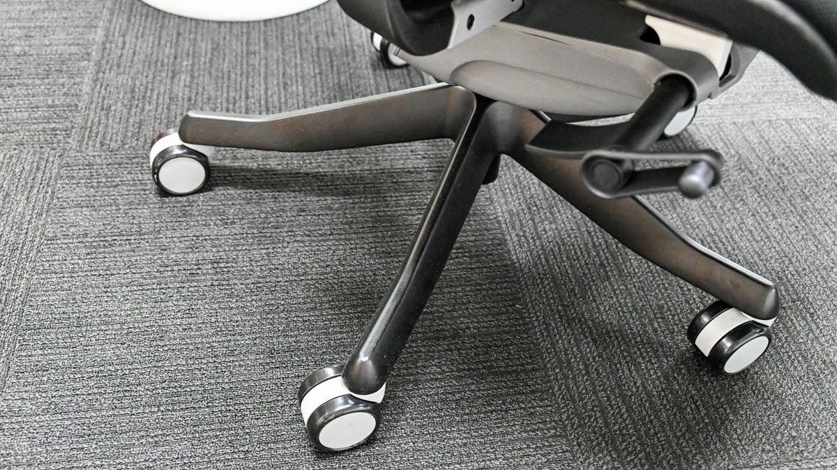 Black and grey caster wheels under the Desky Pro Plus Ergonomic Chair