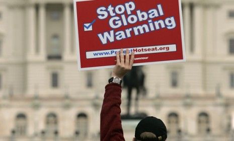 A demonstrator outside the Capital during a 2007 Climate Change Protest