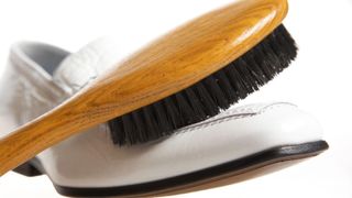 brush cleaning white shoes