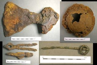 Other artifacts found in the grave include a broad-bladed ax (top left), shield box (top right), ringed pin (bottom right) and hammer and tongs (bottom left).