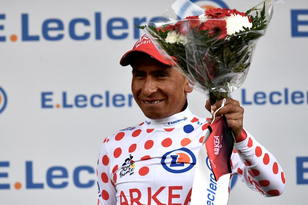 Team Arkea Samsics Nairo Quintana of Colombia celebrates best climbers polka dot jersey on the podium at the end of the 9th stage of the 108th edition of the Tour de France cycling race 144 km between Cluses and Tignes on July 04 2021 Photo by Philippe LOPEZ AFP Photo by PHILIPPE LOPEZAFP via Getty Images