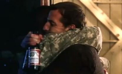 In this Budweiser commercial, a homecoming soldier hugs a (special?) friend, leading some to believe that the beer company is flirting with progressive messages.