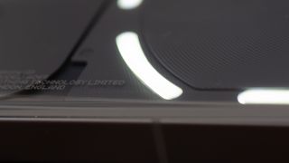 Nothing Phone 2 showing screen and lit glyph LED lights