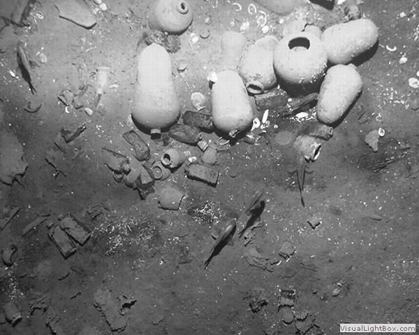 Ceramic and porcelain vessels rest among the wreckage thought to belong to the San Jose galleon.