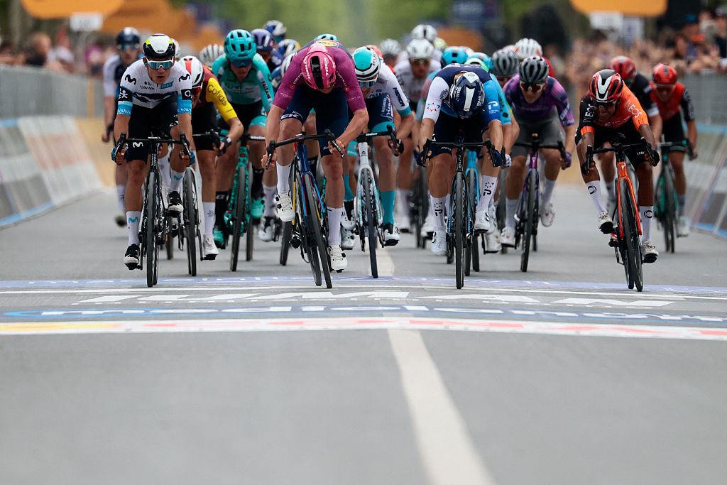 Lidl-Trek's Danish rider Mads Pedersen (C) sprints to the finish line to win the 3rd stage of the 108th Giro d'Italia cycling race, 160km from Vlore to Vlore in Albania, on May 11, 2025. (Photo by Luca Bettini / AFP)