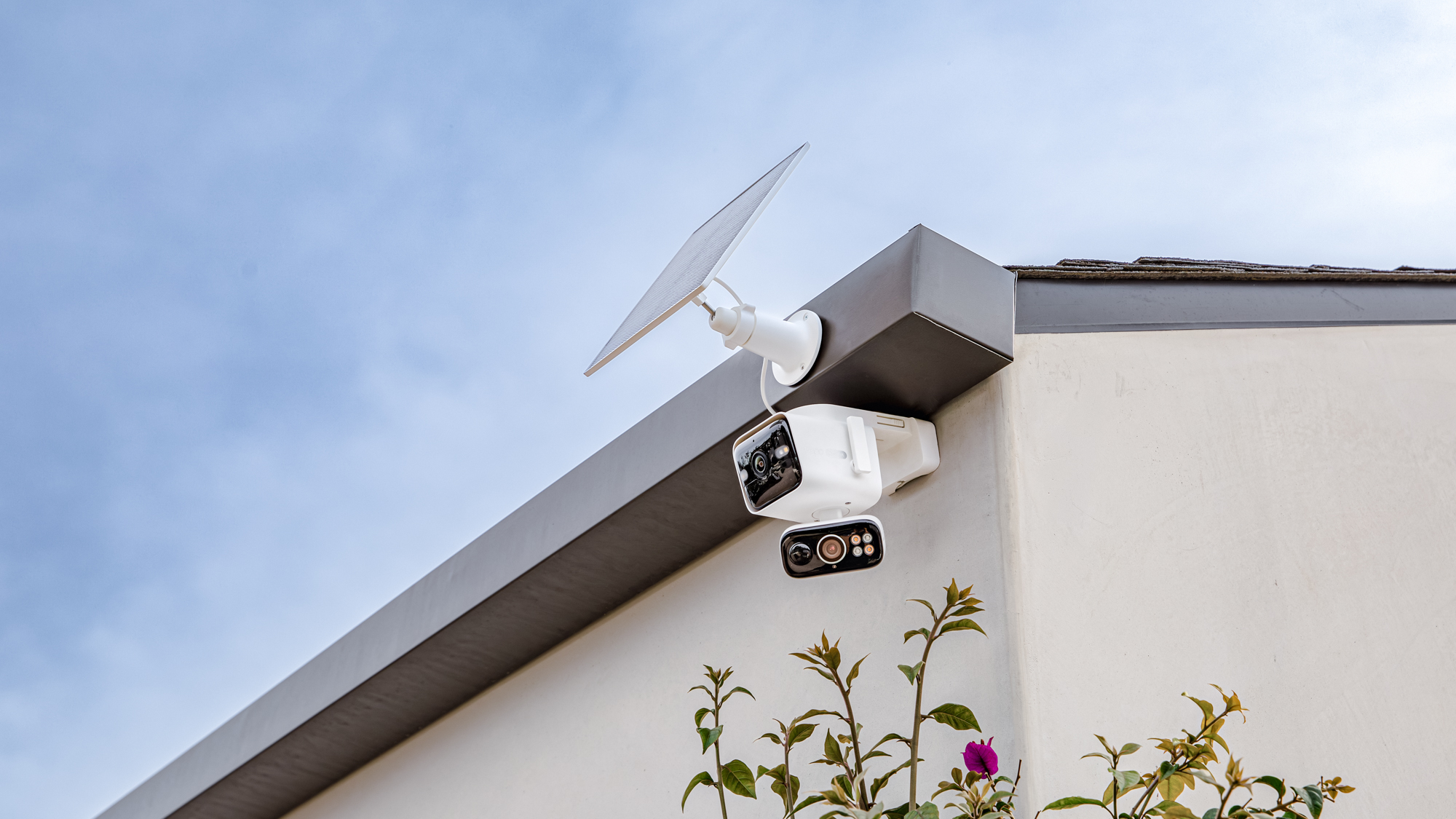 TP-Link Tapo C675D security camera mounted to a house