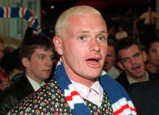 Paul Gascoigne greets fans at Glasgow Airport after signing for Rangers from Lazio, June 1995