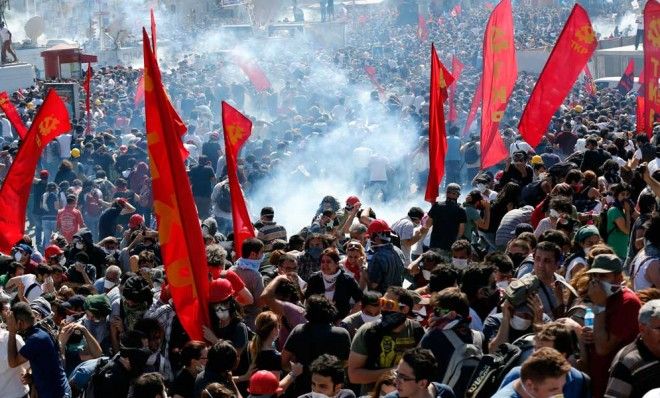 Riot police use tear gas to disperse demonstrators during an anti-government protest at Taksim Square in central Istanbul on June 1.