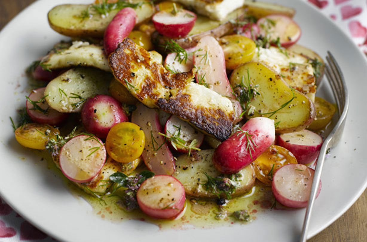 Warm radish, halloumi, potato and cherry tomato salad