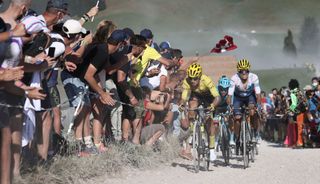 Team Jumbo rider Slovenias Primoz Roglic wearing the overall leaders yellow jersey L and Team Movistar rider Spains Enric Mas 2ndL ride on the Glieres plateau during the 18th stage of the 107th edition of the Tour de France cycling race 168 km between Meribel and La Roche sur Foron on September 17 2020 Photo by KENZO TRIBOUILLARD AFP Photo by KENZO TRIBOUILLARDAFP via Getty Images