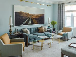 sky blue living room by Mendelson Group