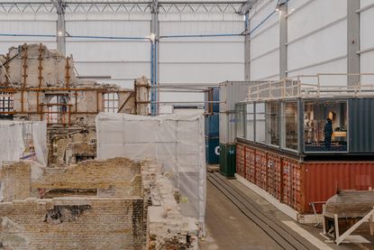 views of b&oslash;rsen visitor centre, a space within the damaged b&oslash;rsen in Copenhagen as it undergoes restoration