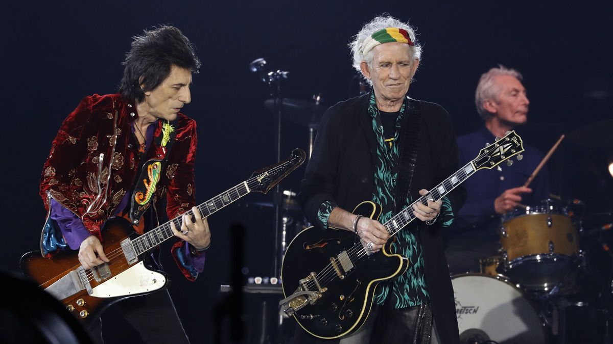 Rolling Stones&#039; Ron Wood (L), Keith Richards (C) and Charlie Watts perform during the inauguration concert of the U Arena hall, new stadium of the French Rugby Union club Racing 92 in Nanterre on October 19, 2017