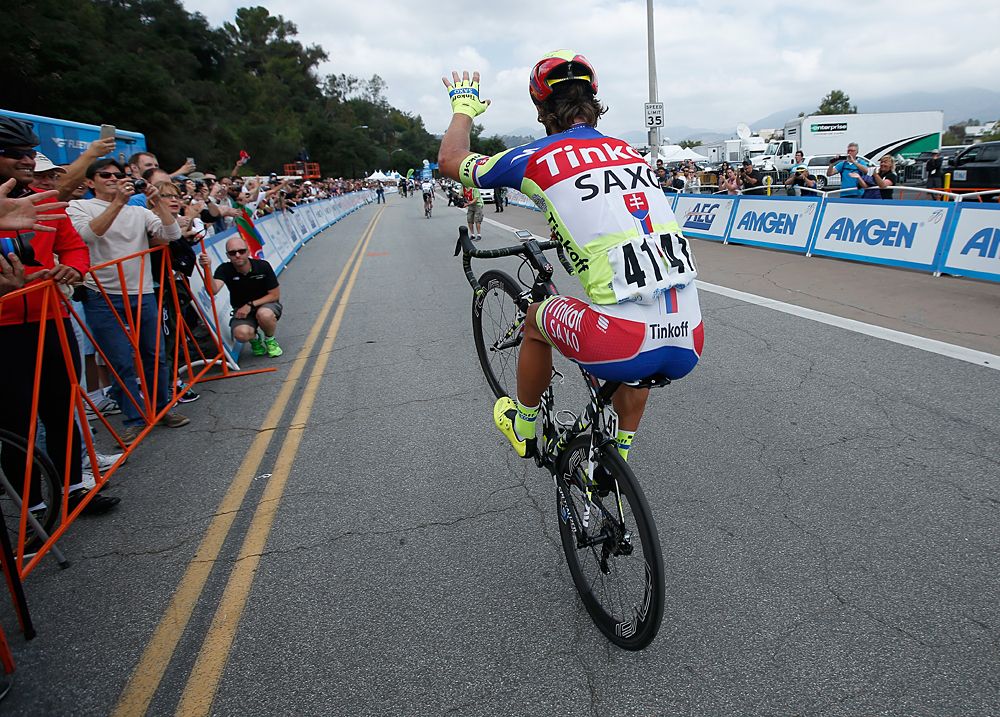 Peter Sagan (Tinkoff-Saxo) wheelies after taking third in stage 8 and winning the overall title at the Tour of California